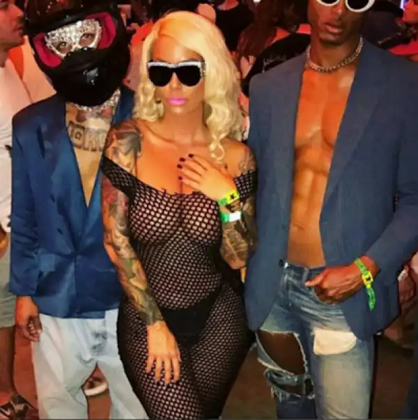 Amber Rose Shows Her Whole B00bies In Fishnet Body Suit For Coachella